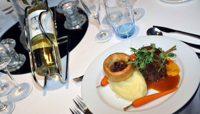 Dinner of feather blade beef with wine